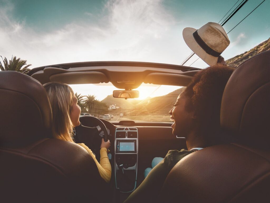 Two girls on a drive not worrying about thier tires