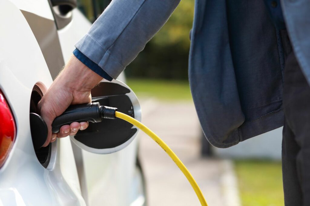 image of man filling up gas tank