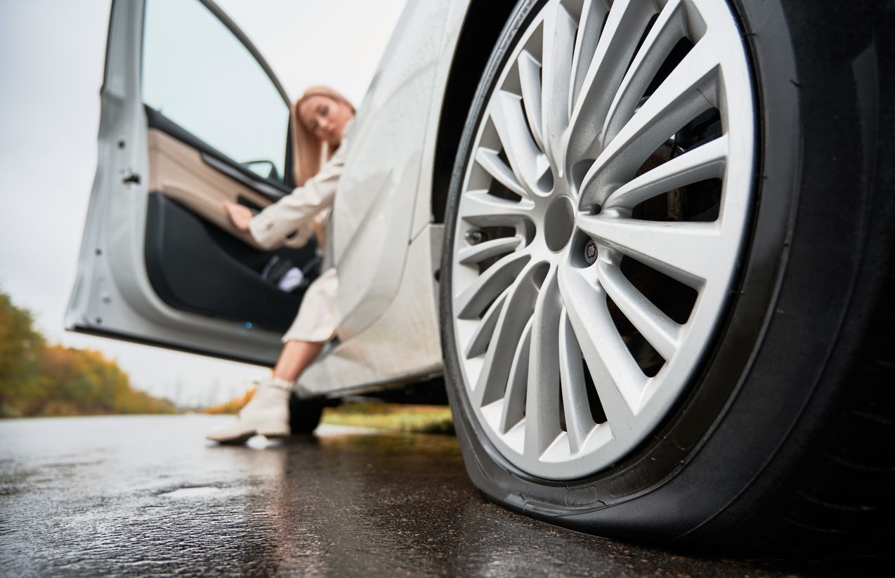 image of flat tire on reat wheel