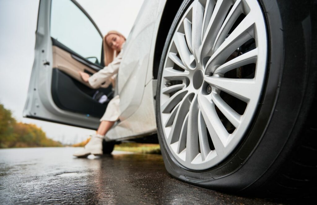 image of flat tire on reat wheel