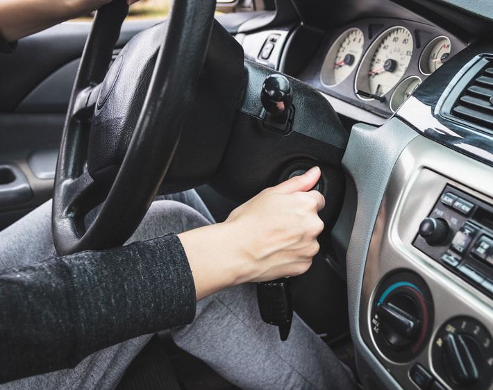 Turning a car key in the ignition